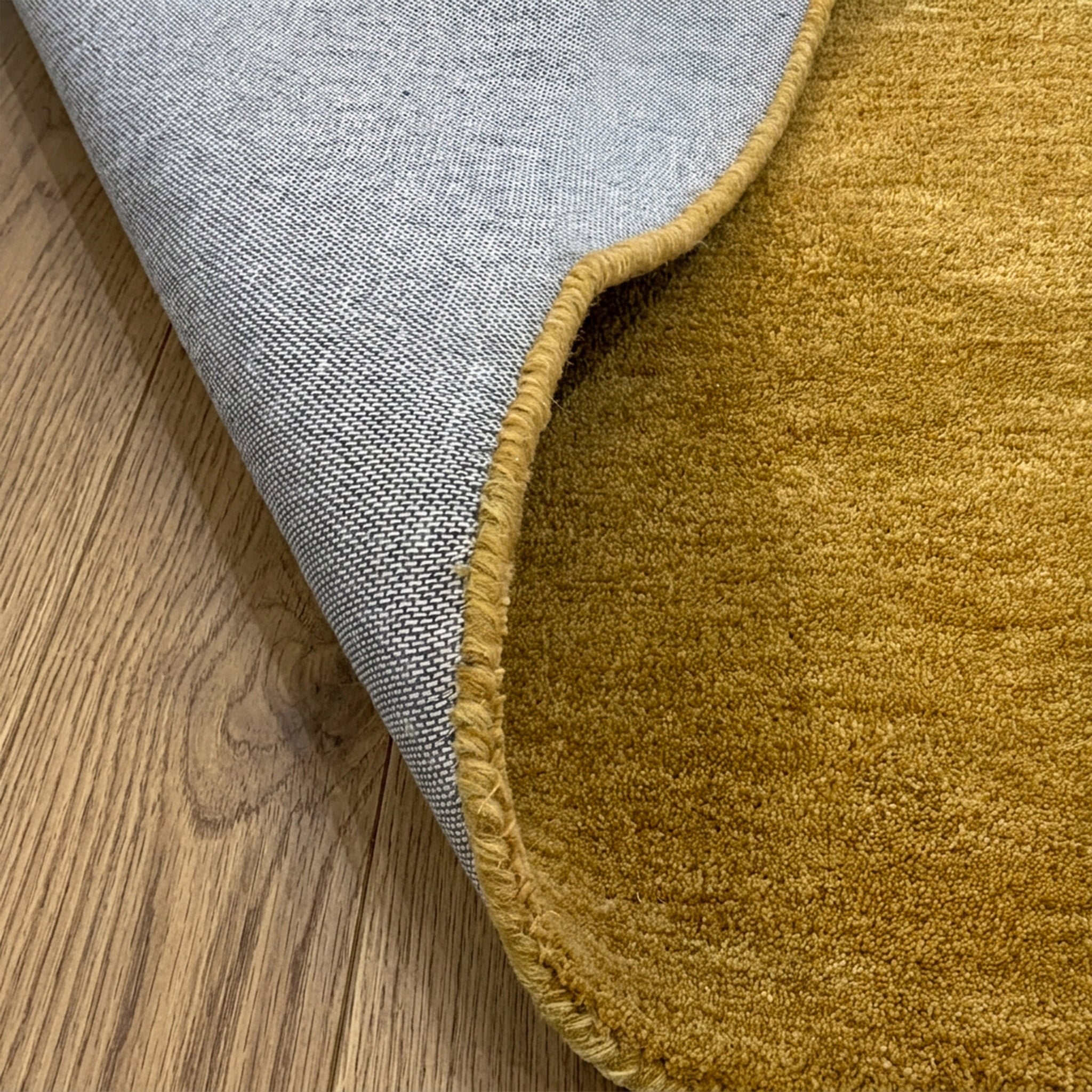 Round wool rug - Leone Gold